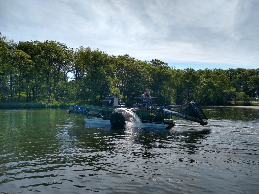 weed boat in Rice Lake